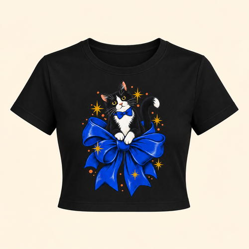 Bow-Tied Cat Women's Graphic Crop Tee featuring a playful black-and-white cat perched on an oversized blue bow, product view 2